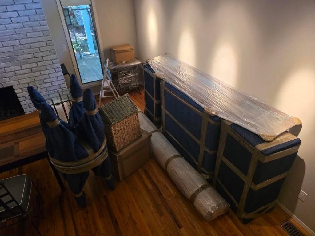 House movers transporting household furniture